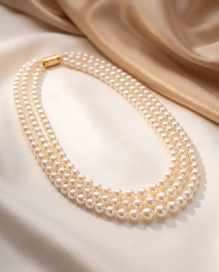 Three-strand pearl necklace