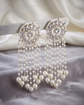 Silver-tone kundan earrings with pearl tassels
