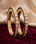 Stone-set bangles with black edging